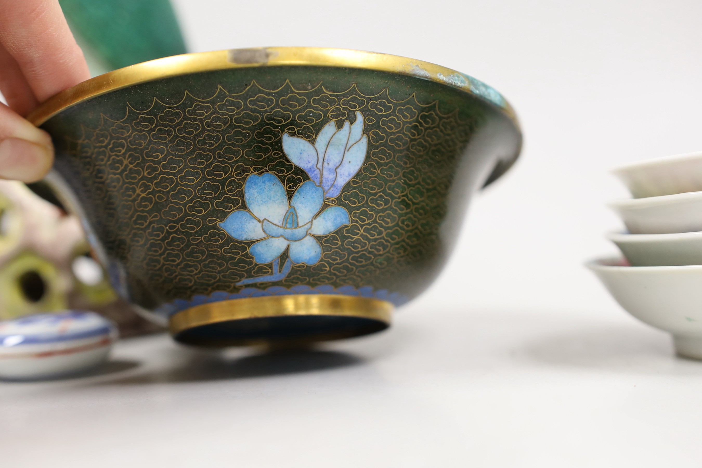 A group of Chinese hardstone carvings, a cloisonné enamel bowl, famille rose dishes and four blue and white bowls and model bird. Tallest 23cm